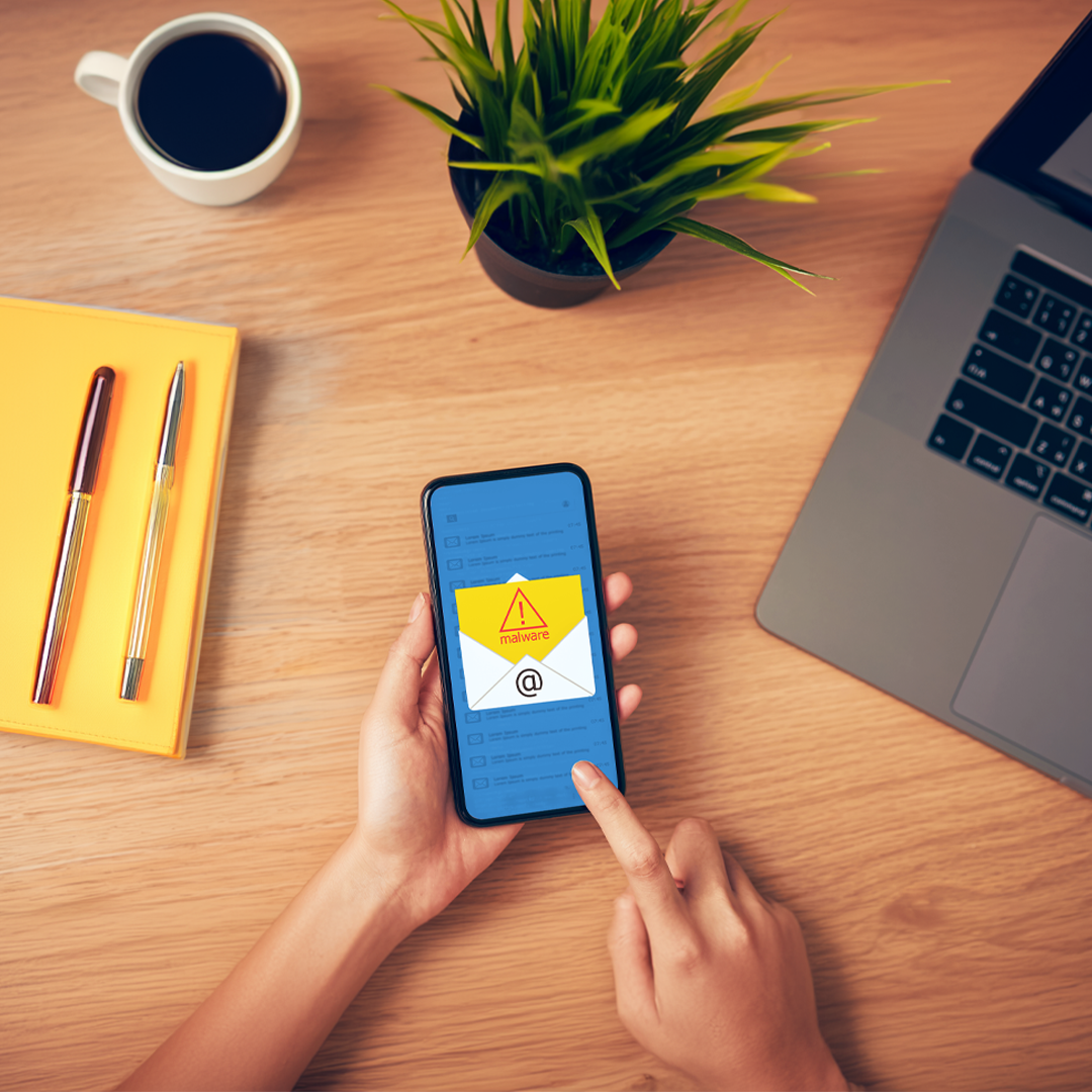 Malware scam E-mail on a cell phone.